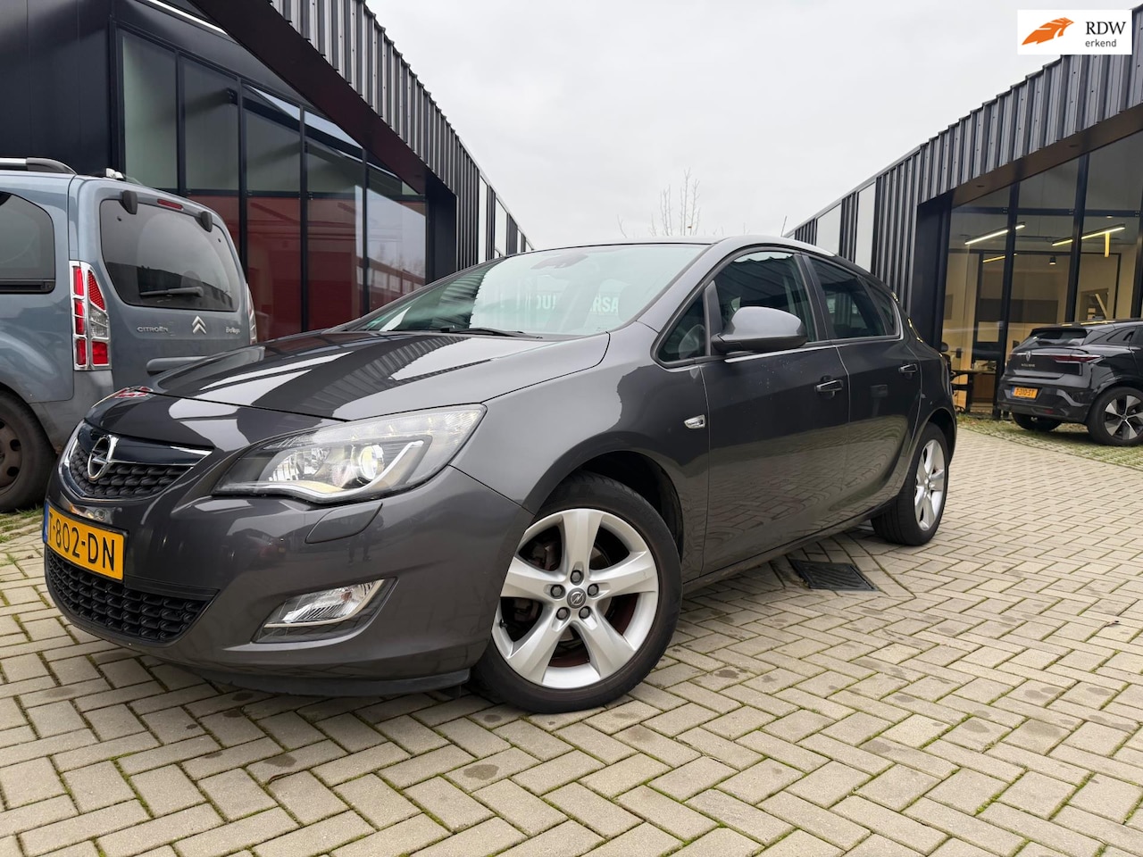 Opel Astra - 1.4 Turbo Sport Airco Cruise Stoelvw - AutoWereld.nl