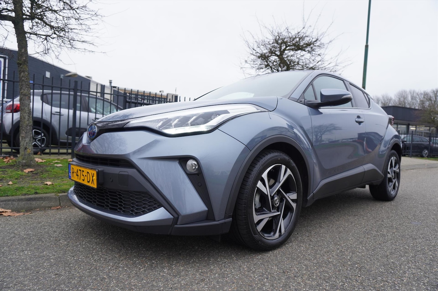 Toyota C-HR - 1.8 Hybrid 122pk CVT Business Plus Navigatie Apple Carplay - AutoWereld.nl