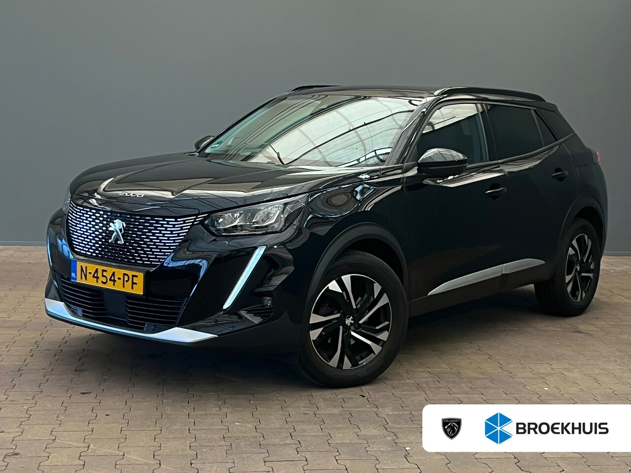 Peugeot 2008 - 1.2 PureTech Blue Lease Allure Camera | Carplay | Parkeersensoren | Digitaal Dashboard | L - AutoWereld.nl