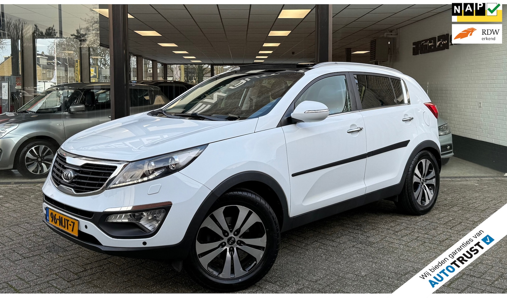 Kia Sportage - 2.0 X-clusive AUTOMAAT | CLIMATE | CAMERA | PANO DAK | NAP - AutoWereld.nl