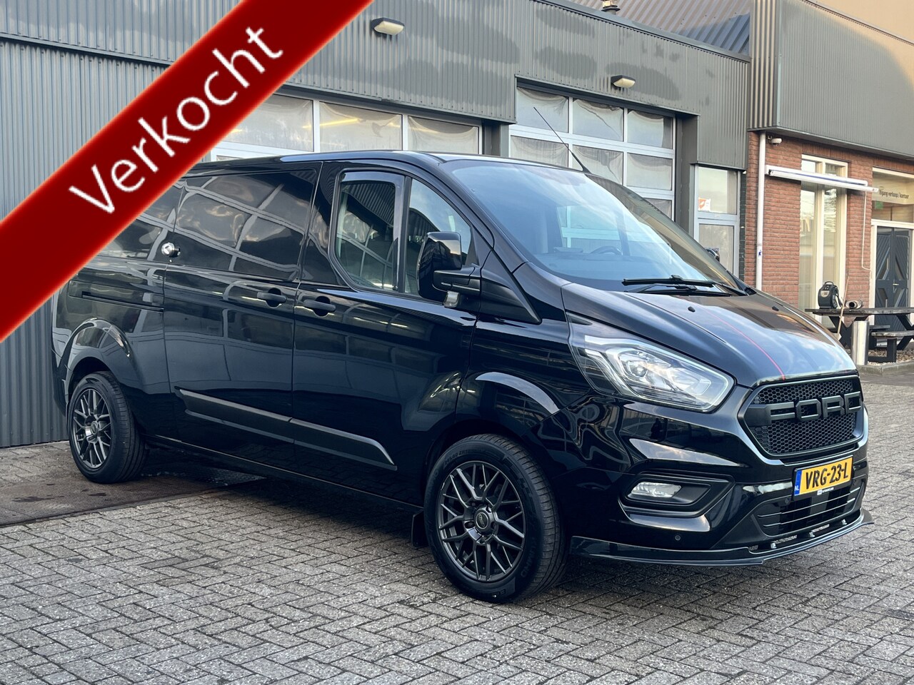 Ford Transit Custom - 300 2.0 TDCI L2H1 Sortimo kastinrichting Airco Cruise control Trekhaak 2640kg trekgewicht - AutoWereld.nl