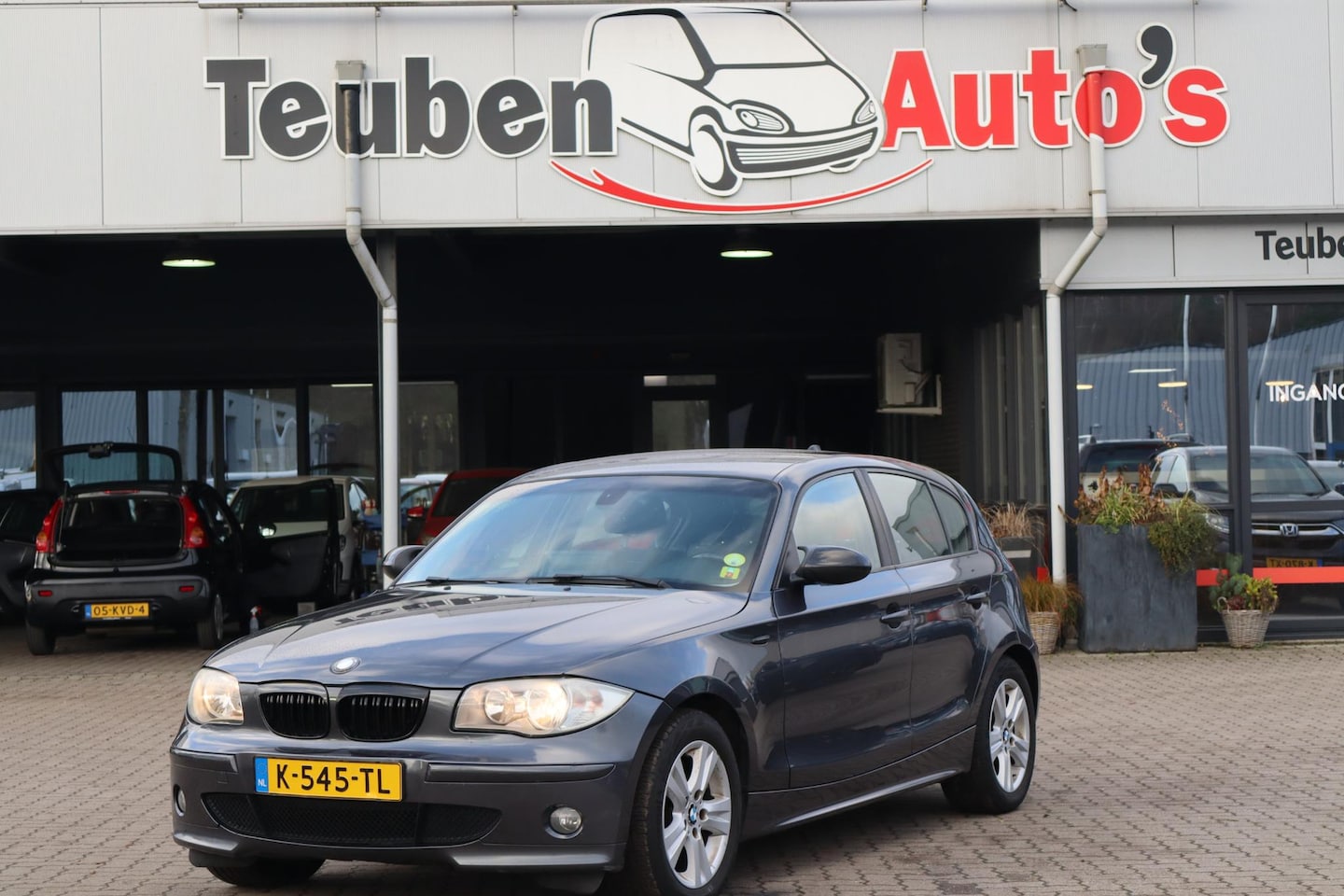 BMW 1-serie - 116i Airco, Radio cd speler, Elektrische ramen, Cruise control, Navigatie - AutoWereld.nl