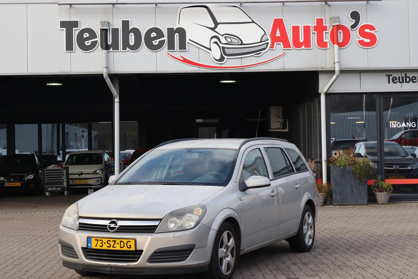 Opel Astra Wagon - 1.6 Enjoy Airco, Elektrische ramen, Trekhaak, Blanke lak laat los. - AutoWereld.nl