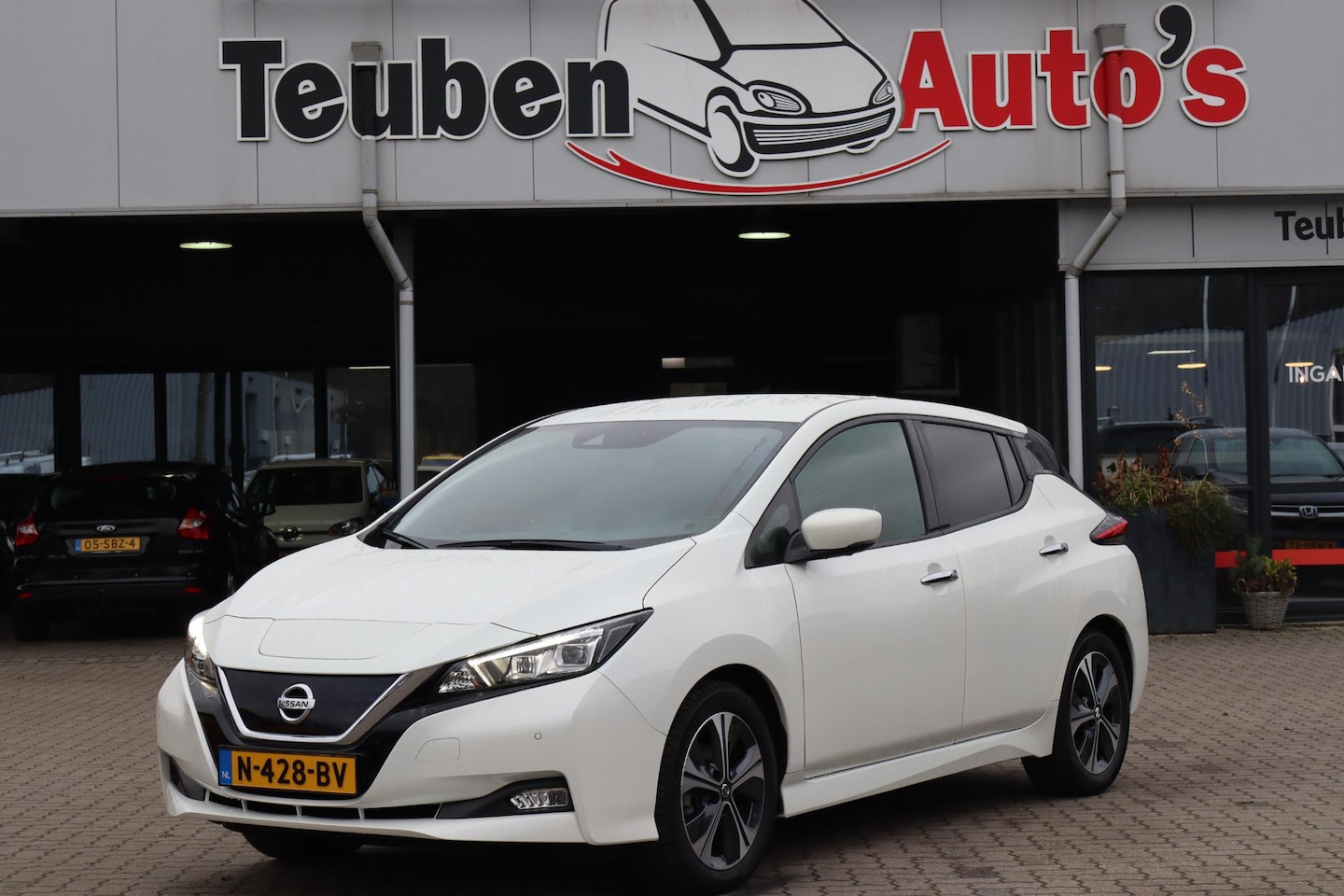 Nissan LEAF - N-Connecta 40 kWh 91,1% SOH, Navigatie, Cruise control, 360 Camera, Stoelverwarming, Leder - AutoWereld.nl