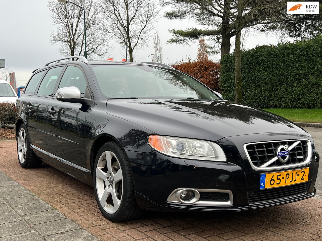 Volvo V70 - 2.0T R-Design Edition *LEDER|NAVI |TREKHAAK - AutoWereld.nl
