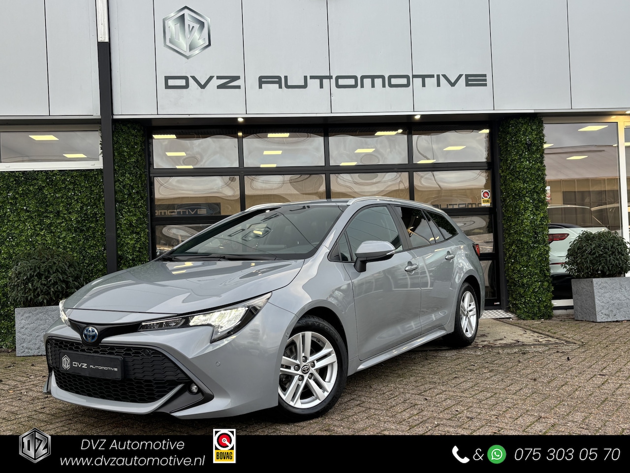 Toyota Corolla Touring Sports - 1.8 Hybrid Business Plus | ACC | Camera | HUD | Winterpack - AutoWereld.nl