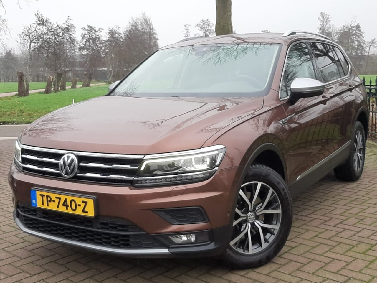 Volkswagen Tiguan - 1.4 TSi 150pk All-Space Airco Navigatie Bluetooth Adap. Cruise-control  Wegdraaibare-Trekh - AutoWereld.nl