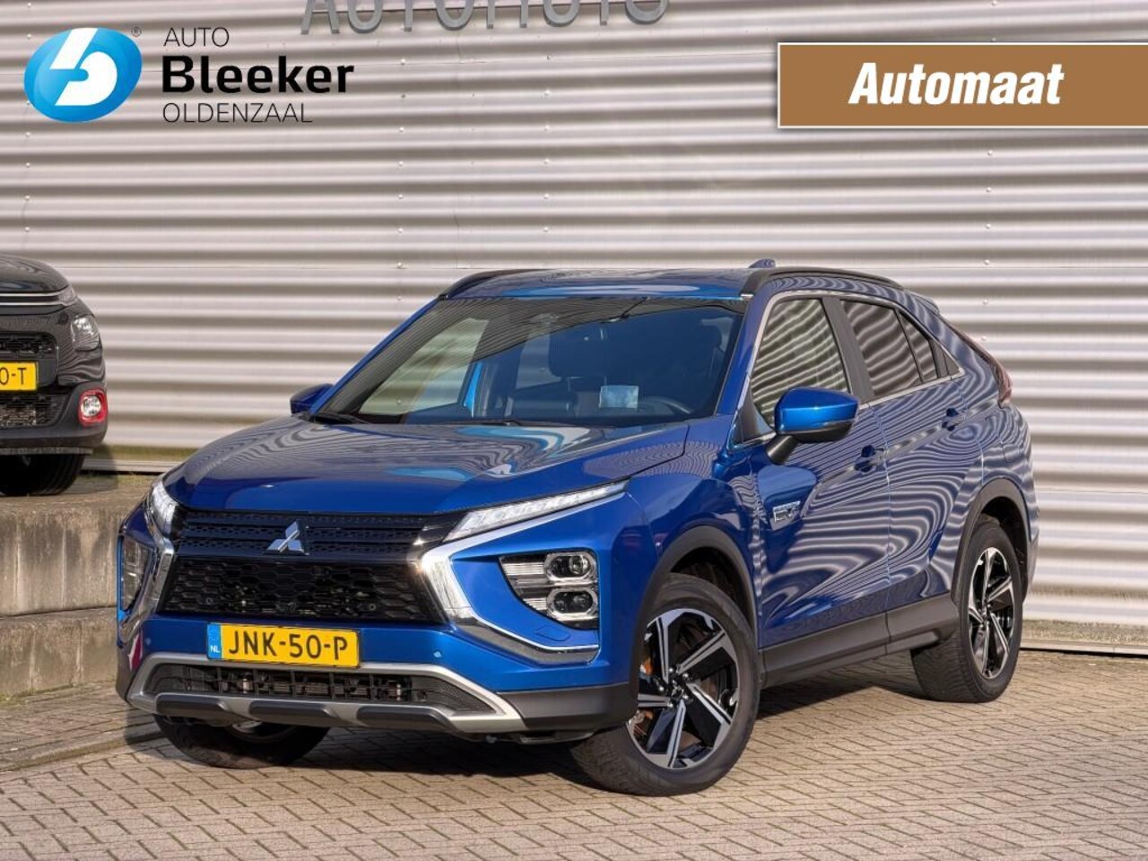 Mitsubishi Eclipse Cross - 2.4 PHEV 177Pk Intense Airco Electr stoel Cruise Camera Navi - AutoWereld.nl
