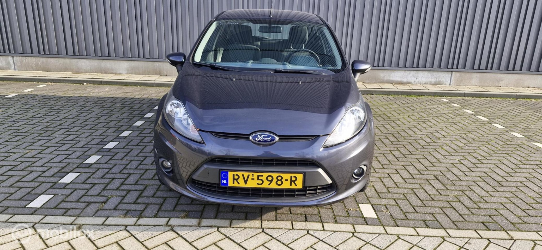 Ford Fiesta - 1.25 Ghia 1.25 Ghia - AutoWereld.nl