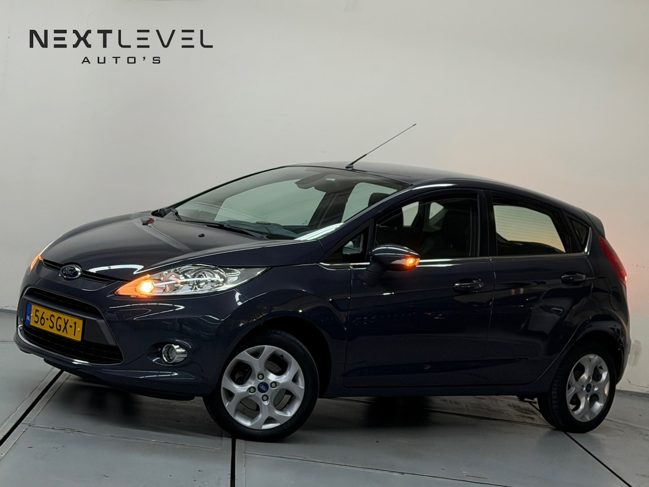 Ford Fiesta - 1.25 Titanium Cruise Airco APK - AutoWereld.nl