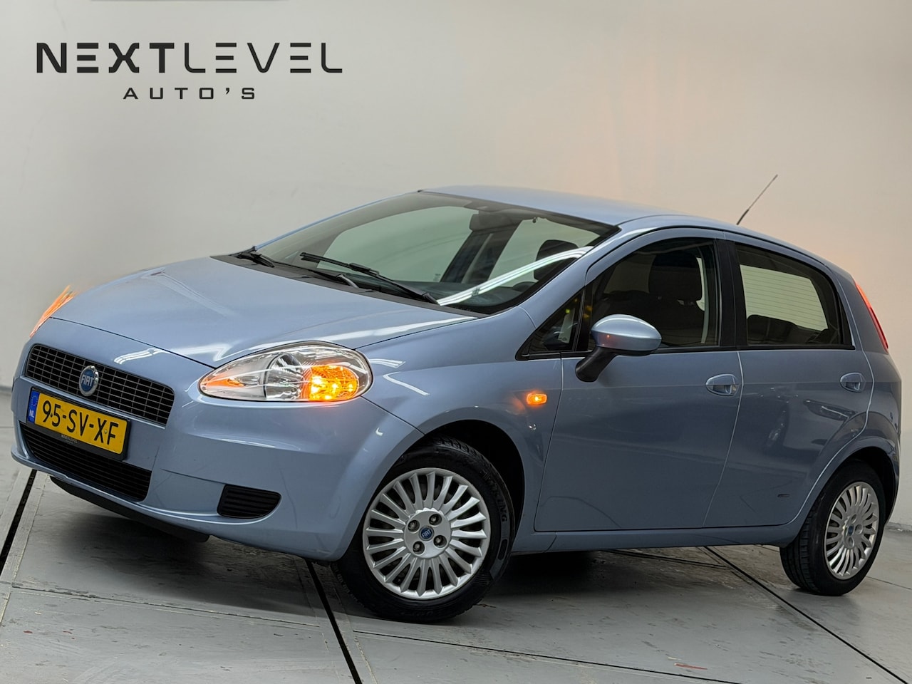 Fiat Grande Punto - 1.4 Edizione Prima Airco Cruise APK - AutoWereld.nl