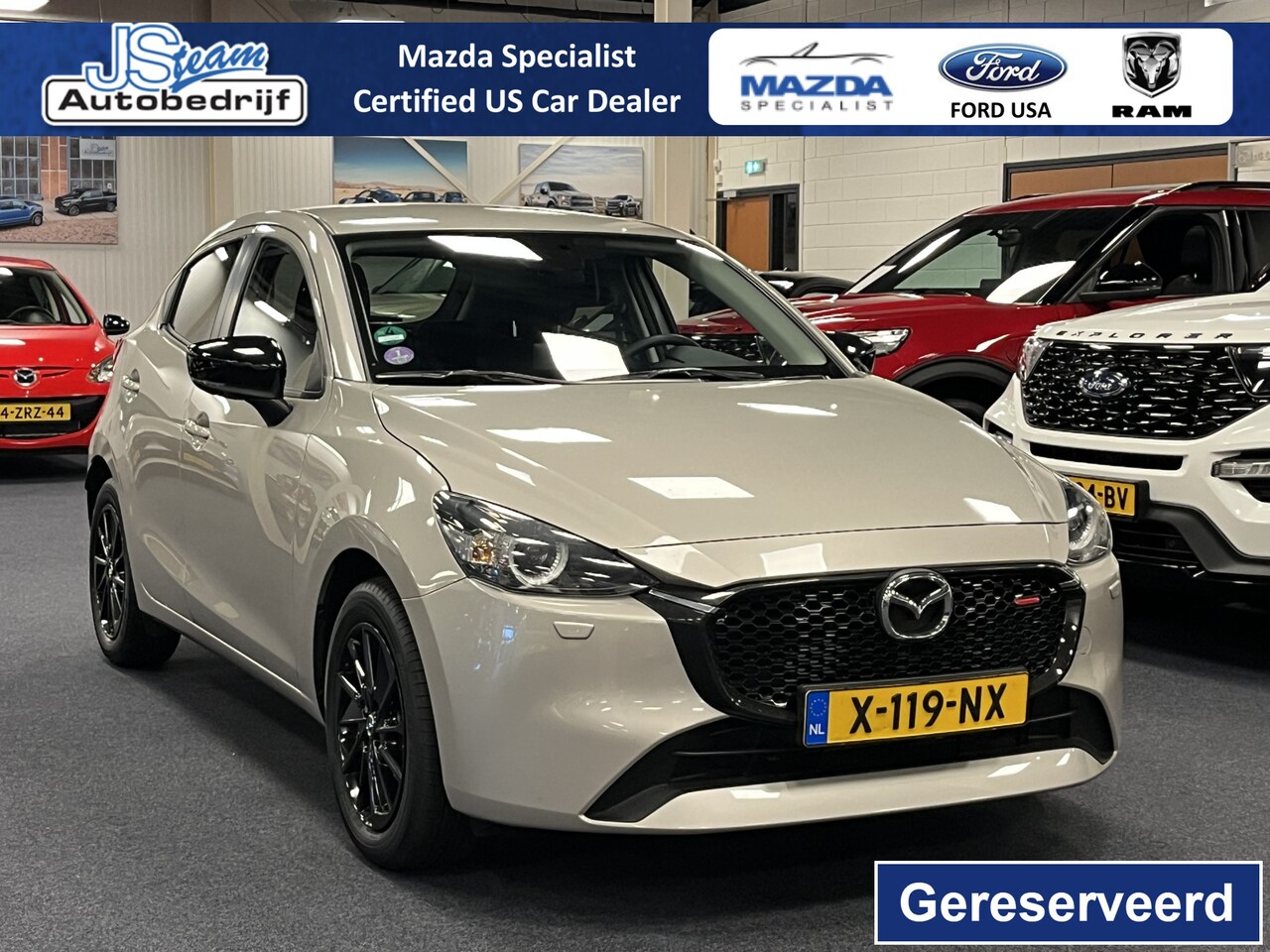 Mazda 2 Hybrid - 1.5i e-SkyActiv-G Homura 90PK M Hybrid Navi DAB+ Apple CarPlay Camera PDC Trekhaak - AutoWereld.nl