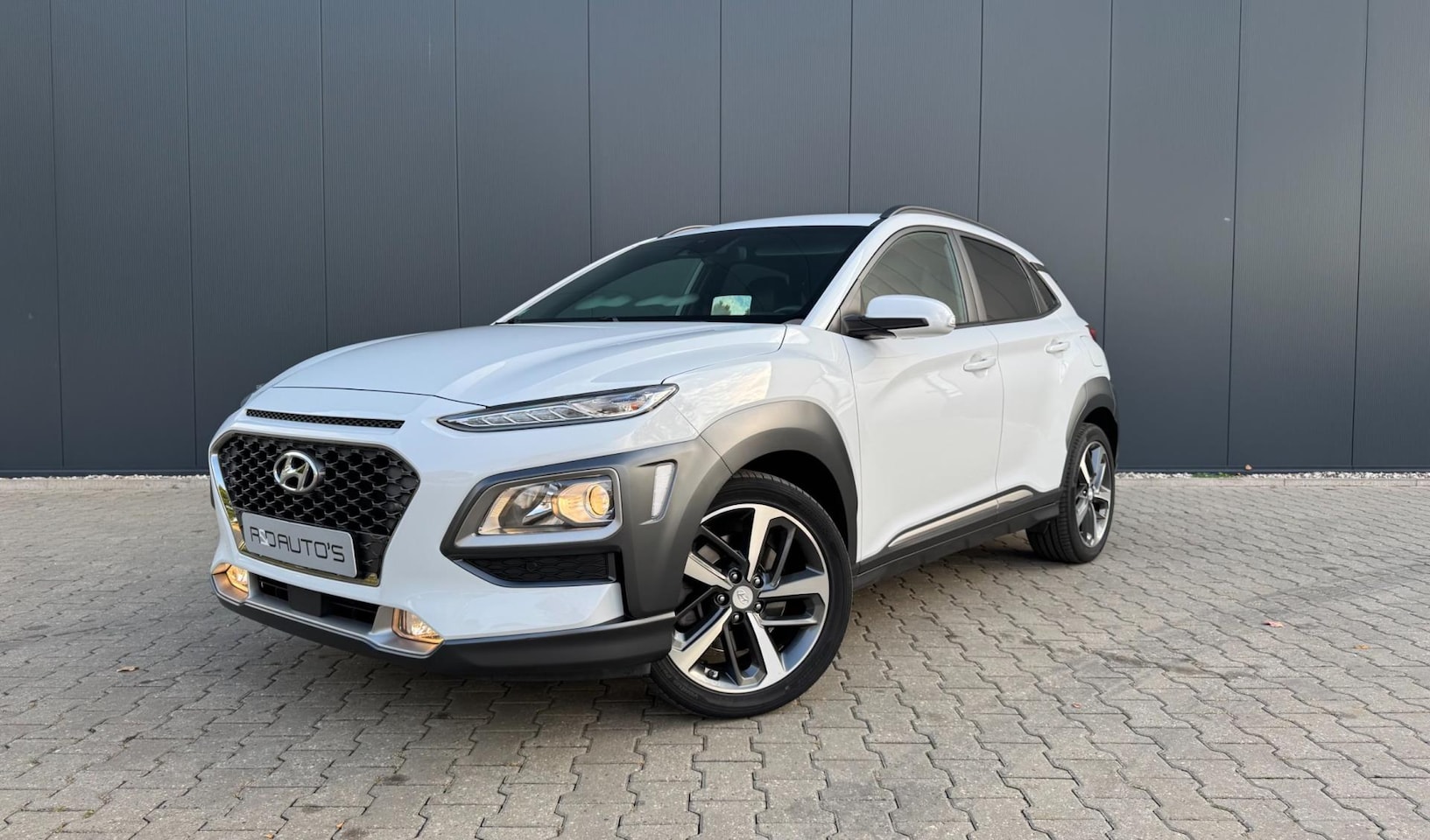 Hyundai Kona - 1.6 GDI HEV Premium 4x4 Sport int. vele opties 1e eig. - AutoWereld.nl