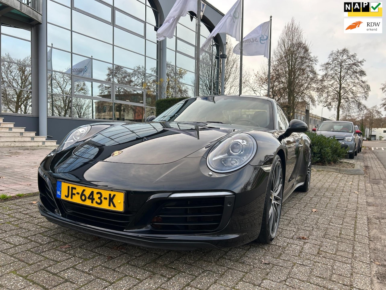 Porsche 911 - 3.0 Carrera 4 aut /pano/20 inch/sport chrono - AutoWereld.nl