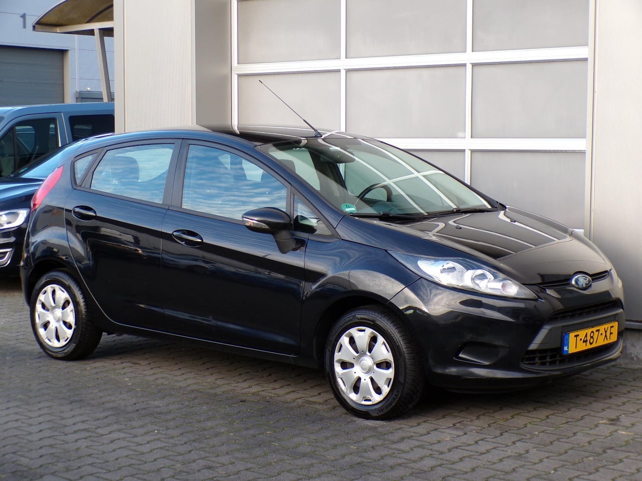 Ford Fiesta - 1.4 Ghia|Automaat|Airco|Aux|Elektrische ramen - AutoWereld.nl