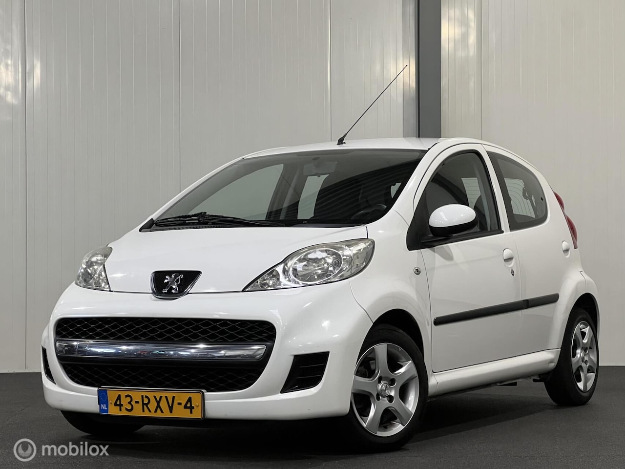 Peugeot 107 - 1.0-12V XS 5-drs [ NAP airco LM velgen ] - AutoWereld.nl