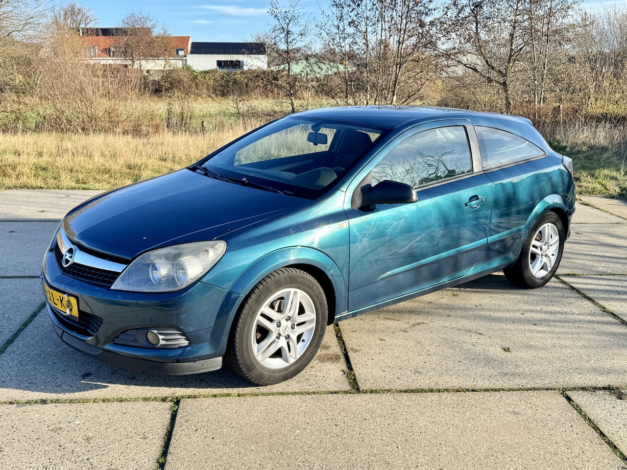 Opel Astra GTC - 1.6 227.129km NAP airco lm velgen trekhaak - AutoWereld.nl