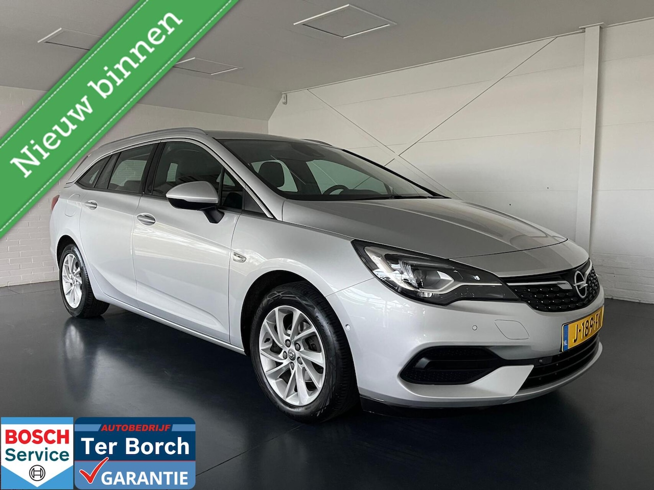 Opel Astra Sports Tourer - 1.2 Elegance 1.2 Elegance ,LED,Camera,Trekhaak - AutoWereld.nl
