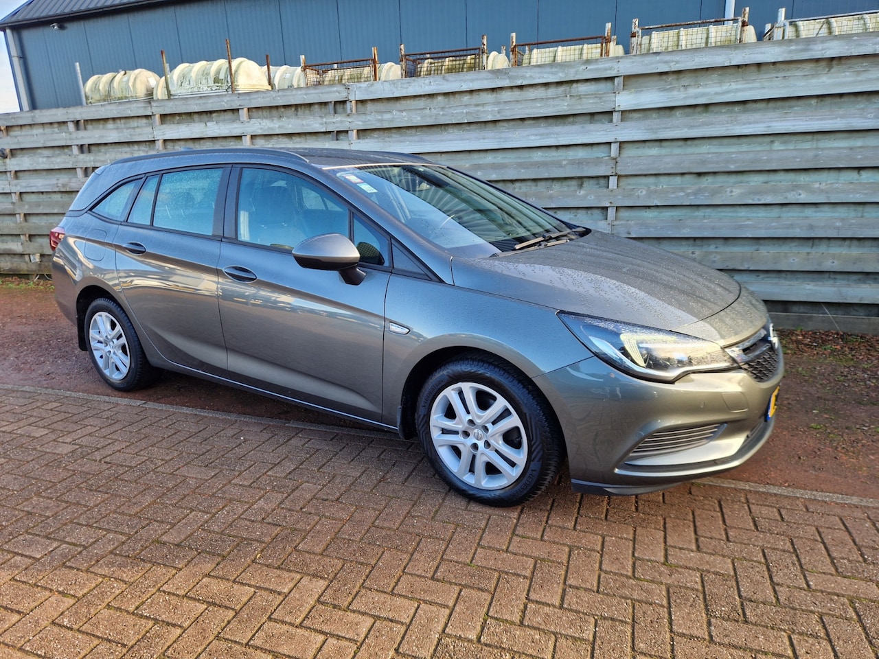 Opel Astra Sports Tourer - 1.0 Online Edition Navigatie - AutoWereld.nl