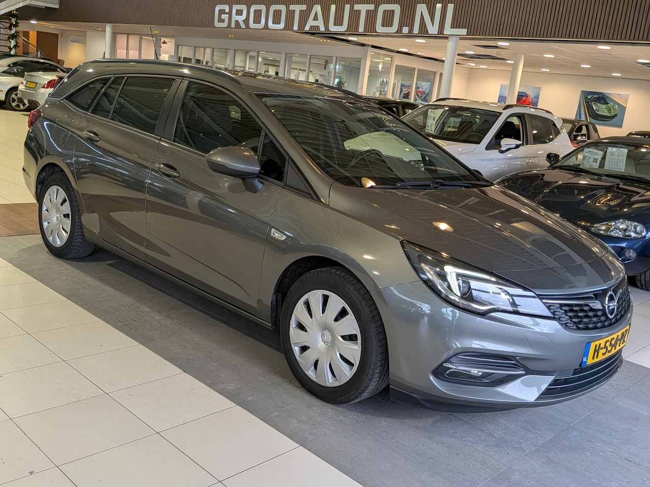 Opel Astra Sports Tourer - 1.2 Business Edition Airco, Cruise Control, Stuurbekrachtiging - AutoWereld.nl