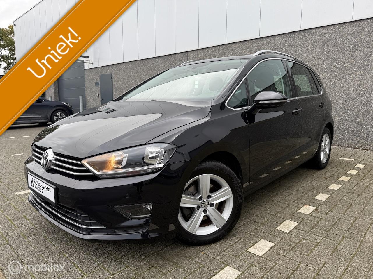 Volkswagen Golf Sportsvan - 1.6 TDI Highline Lage km's - AutoWereld.nl