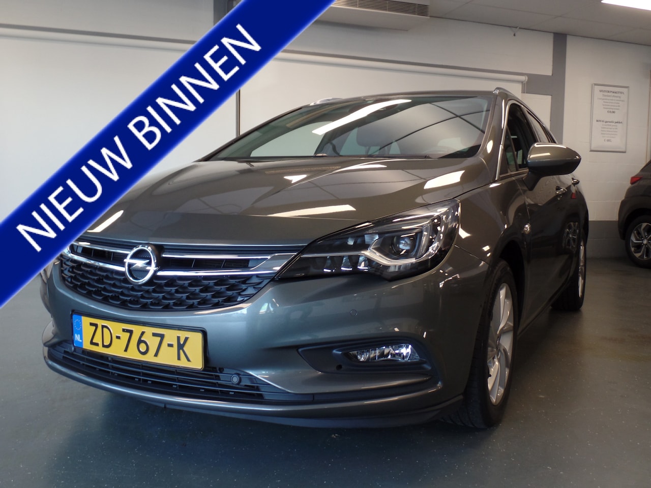 Opel Astra Sports Tourer - 1.4 Innovation 140pk 1400kg trekgewicht, Navigatie, Clima controle, Cruise controle, Achte - AutoWereld.nl