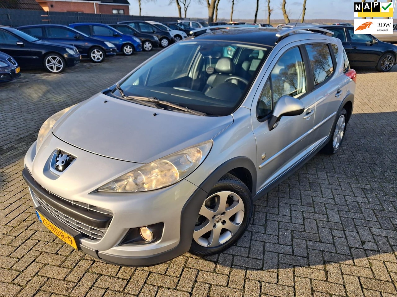 Peugeot 207 SW Outdoor - 1.6 VTi 2010. Airco/Cruise/Half leder/Trekhaak etc.. APK 10-2026 - AutoWereld.nl