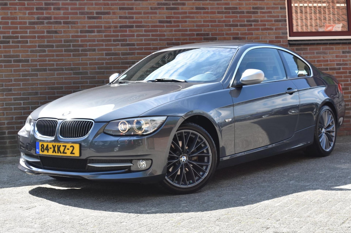 BMW 3-serie Coupé - 320i Corporate Lease Mineralgrey Edition '12 Xenon Leder CLima Navi Cruise Inruil mogelijk - AutoWereld.nl