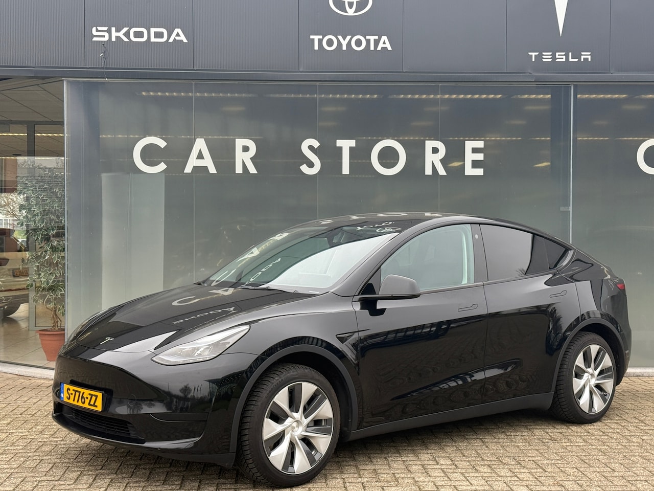 Tesla Model Y - RWD 58 kWh 100% SOH Autopilot - AutoWereld.nl