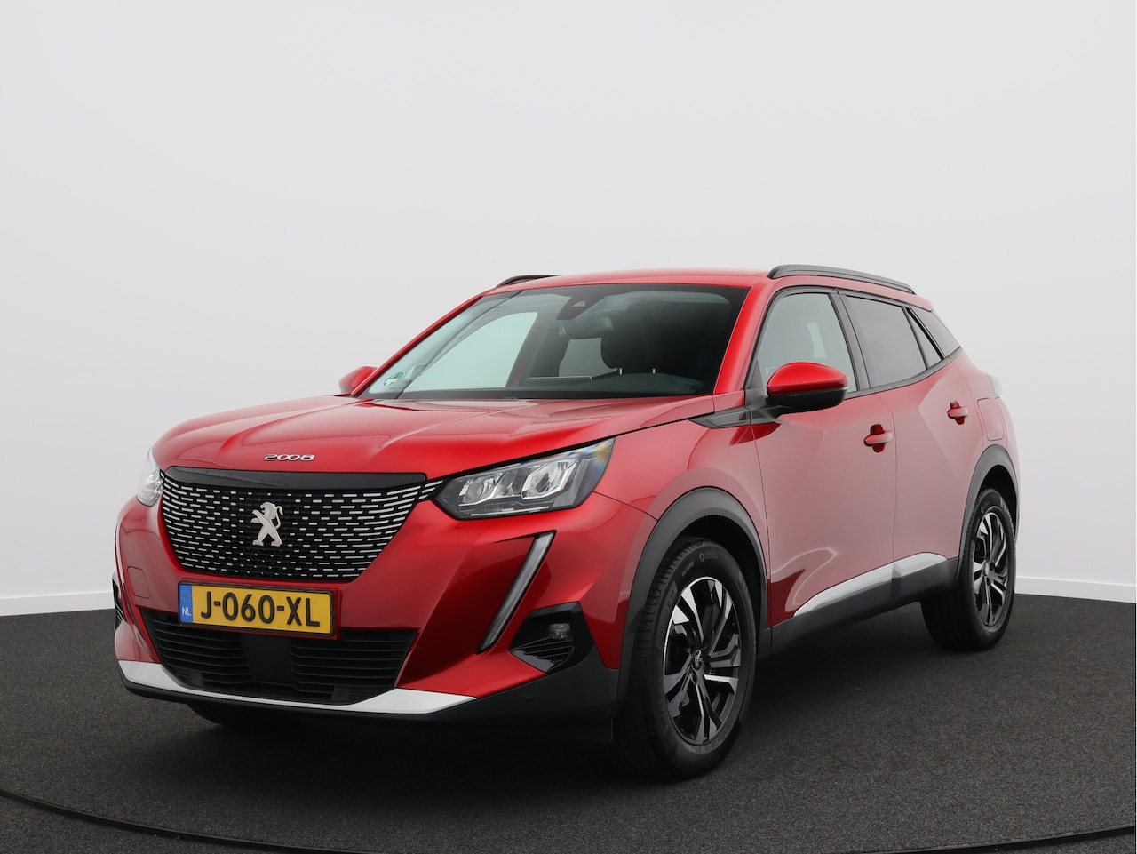 Peugeot 2008 - 1.2 PureTech Blue Lease Allure/ lage km/ compleet! - AutoWereld.nl