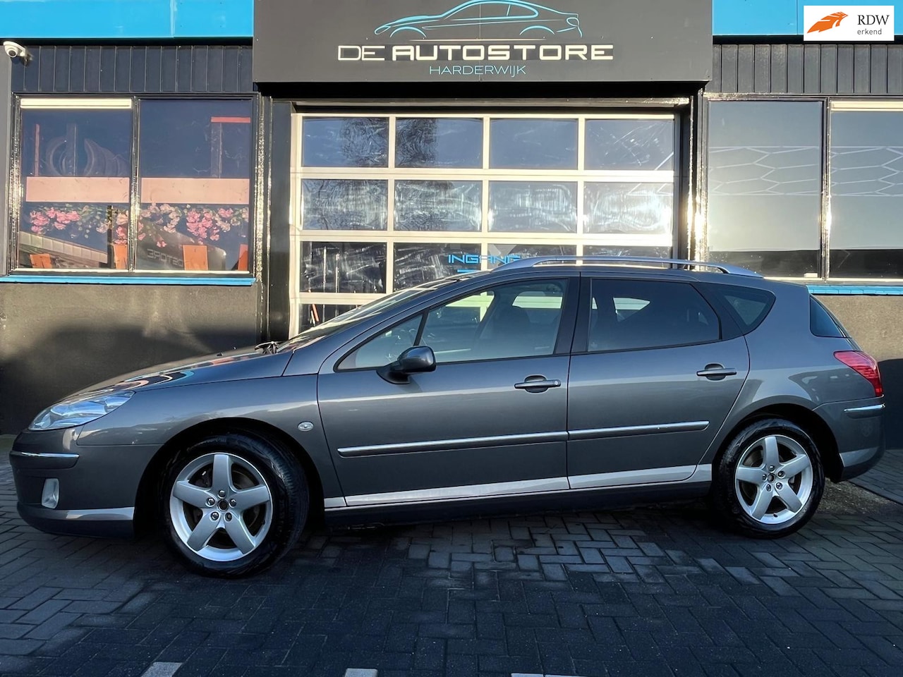 Peugeot 407 SW - 2.0 ST Pack Business Airco Panodak Navi Cruise Pdc Zeer nette auto!!! - AutoWereld.nl
