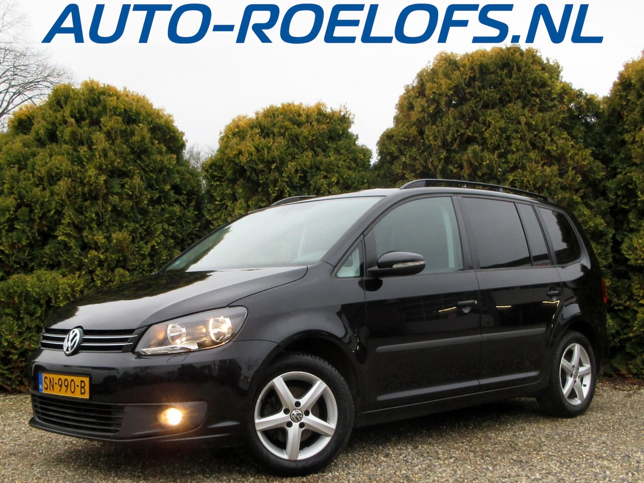 Volkswagen Touran - 1.2 TSI Edition BlueMotion 7persoons / trekhaak - AutoWereld.nl