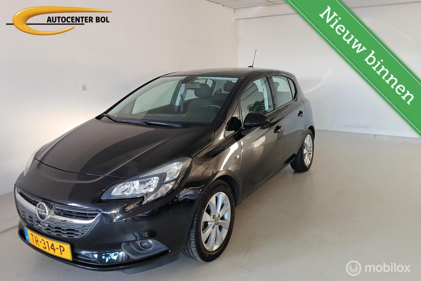 Opel Corsa - 1.4 Favourite 1.4 Favourite 5DRS - AutoWereld.nl