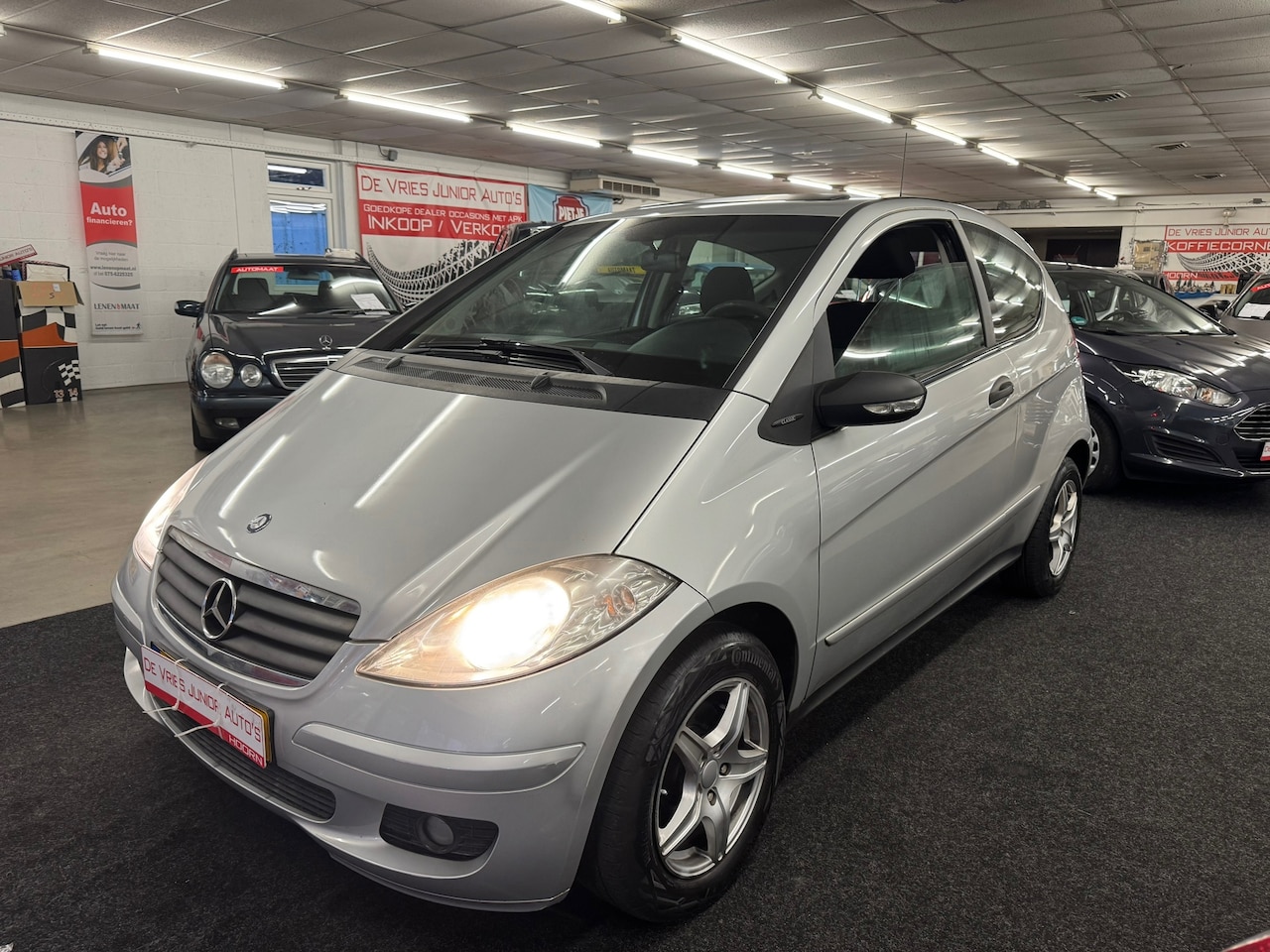 Mercedes-Benz A-klasse - 150 Classic. Cruise control, airco, hoge instap en meer! - AutoWereld.nl