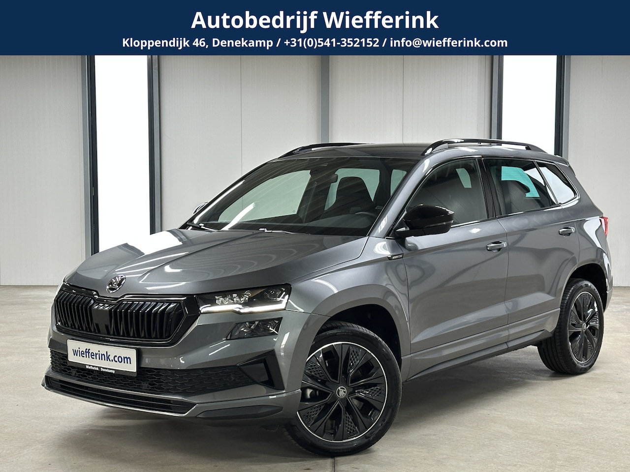 Skoda Karoq - 1.5 TSI 150pk ACT Sportline | Elek. Trekhaak | Navigatiepakket | ACC | Ambient Lighting - AutoWereld.nl