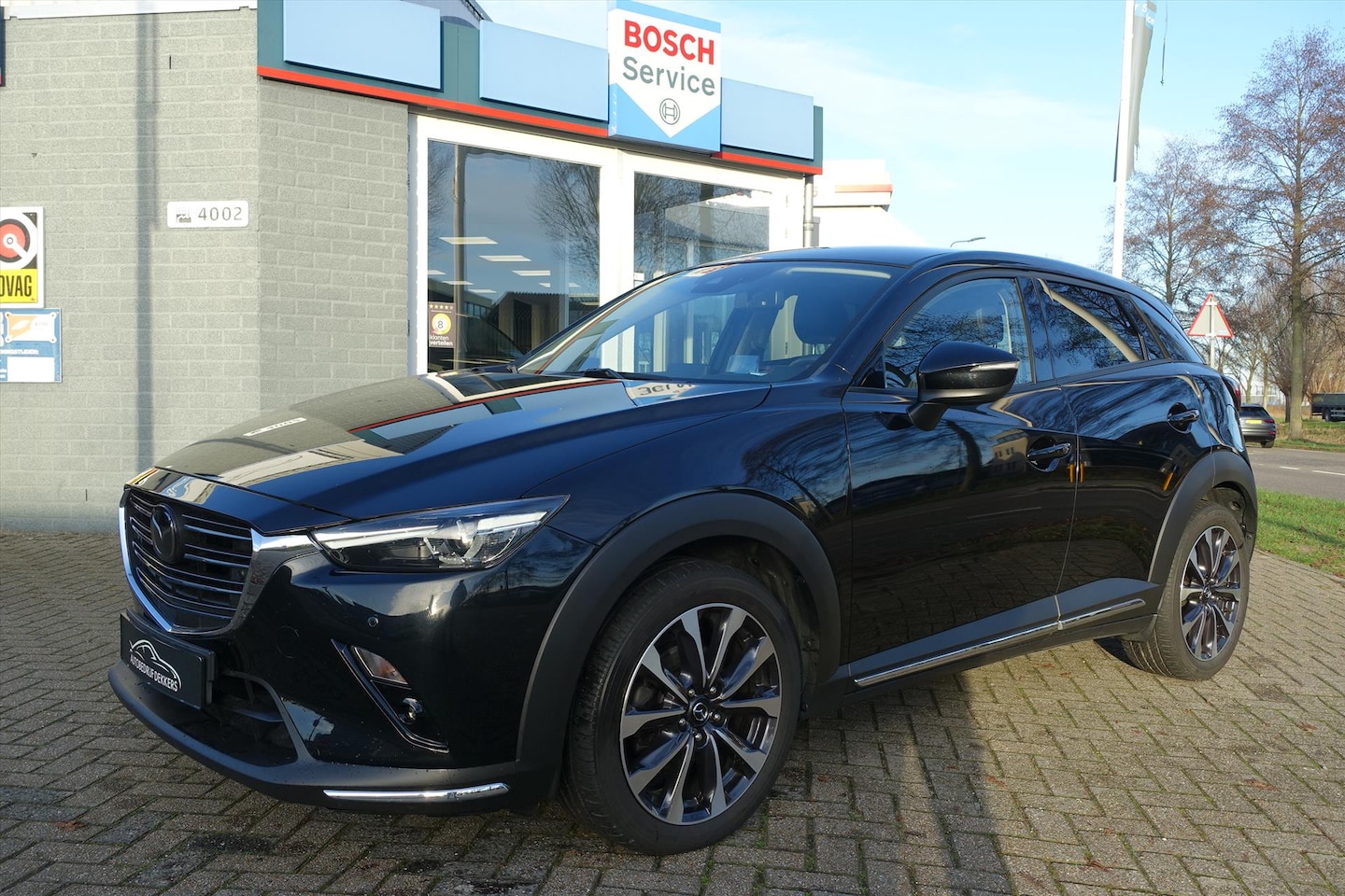 Mazda CX-3 - 2.0 SKYACTIV-G 120pk AUT GT-M | TREKHAAK | BOSE | ACC | HUD | 18'' - AutoWereld.nl