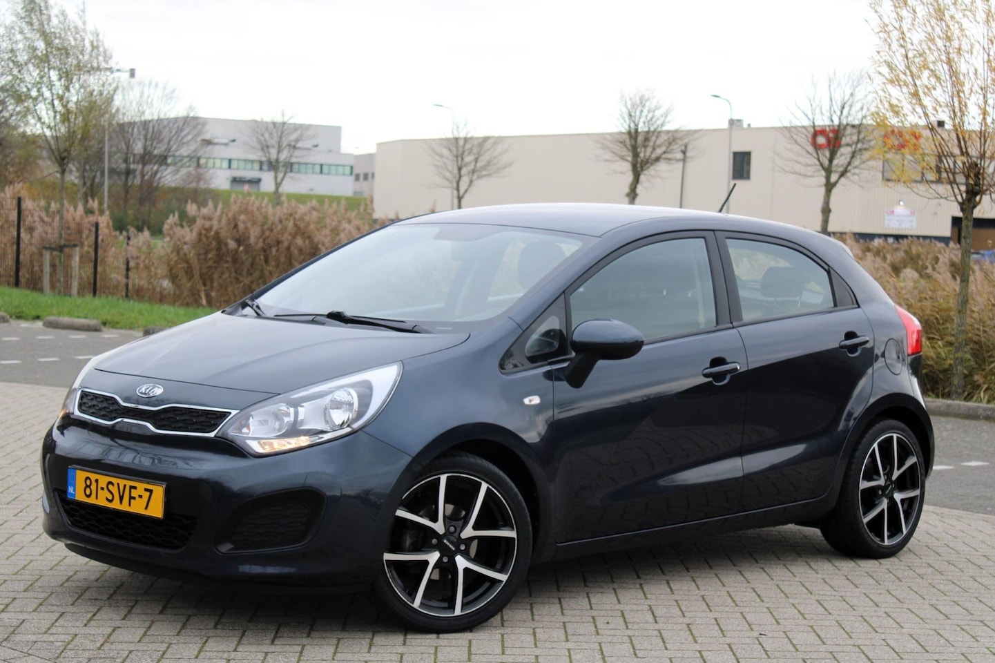 Kia Rio - 1.2 CVVT Comfort Pack l Airco l Elek Pak l Navi - AutoWereld.nl