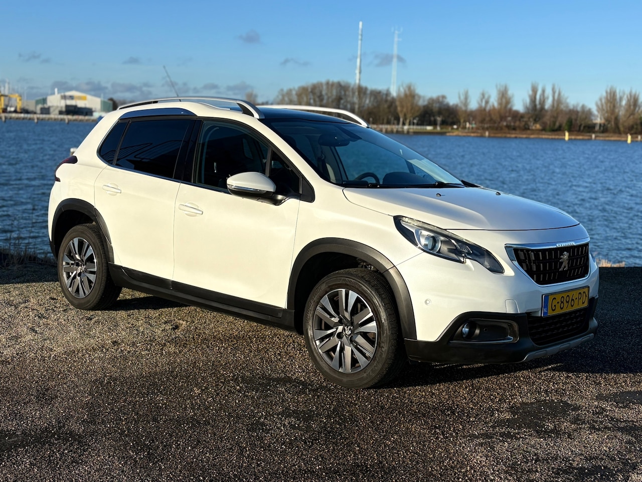 Peugeot 2008 - 1.2 PureTech Allure/Navi/Aut/Leer/park Snr/NAP - AutoWereld.nl