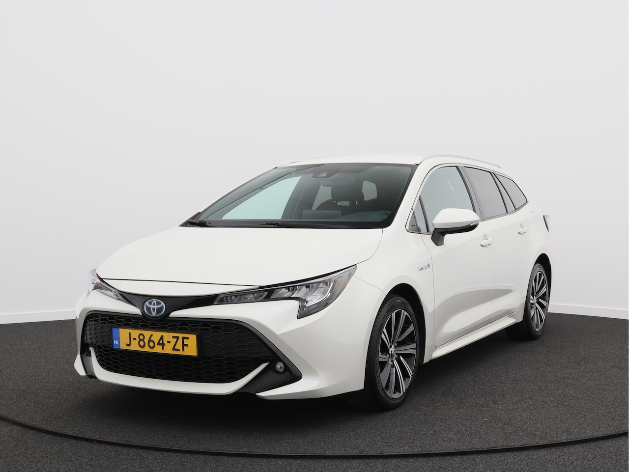 Toyota Corolla Touring Sports - 1.8 Hybrid Business Plus/ lage km/ zeer mooi! - AutoWereld.nl