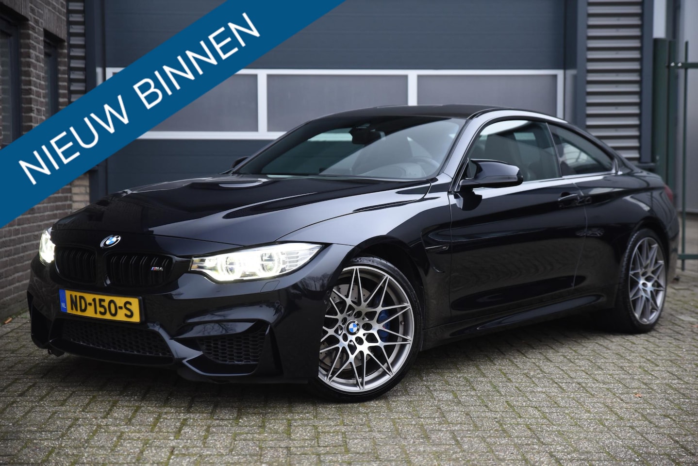 BMW 4-serie Coupé - M4 Competition H&K - HUD - AutoWereld.nl