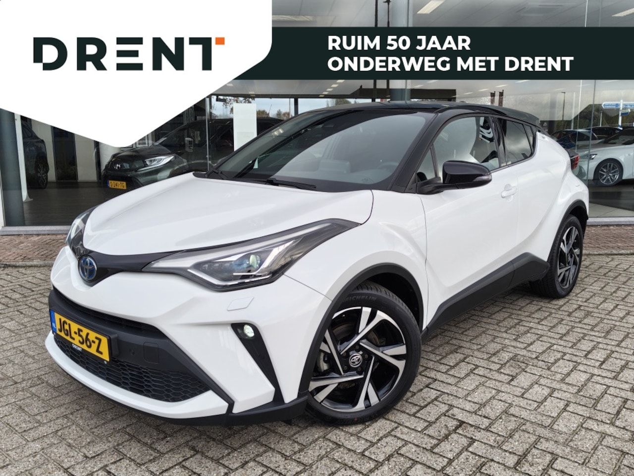 Toyota C-HR - 1.8 Hybrid Style Bi-Tone | Premium Pack | Sensoren v/a | Android - AutoWereld.nl