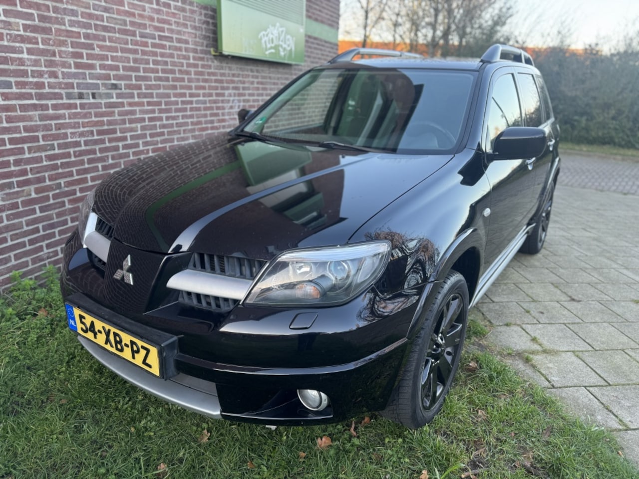 Mitsubishi Outlander Sport - 2.4 Invite Scott 4WD*2007*Airco|Cruise|18"Lmv|Nap - AutoWereld.nl