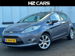 Ford Fiesta - 1.25 Titanium/5drs/Xenon/16"/Clima/Stoelverw./Elektr.pakket