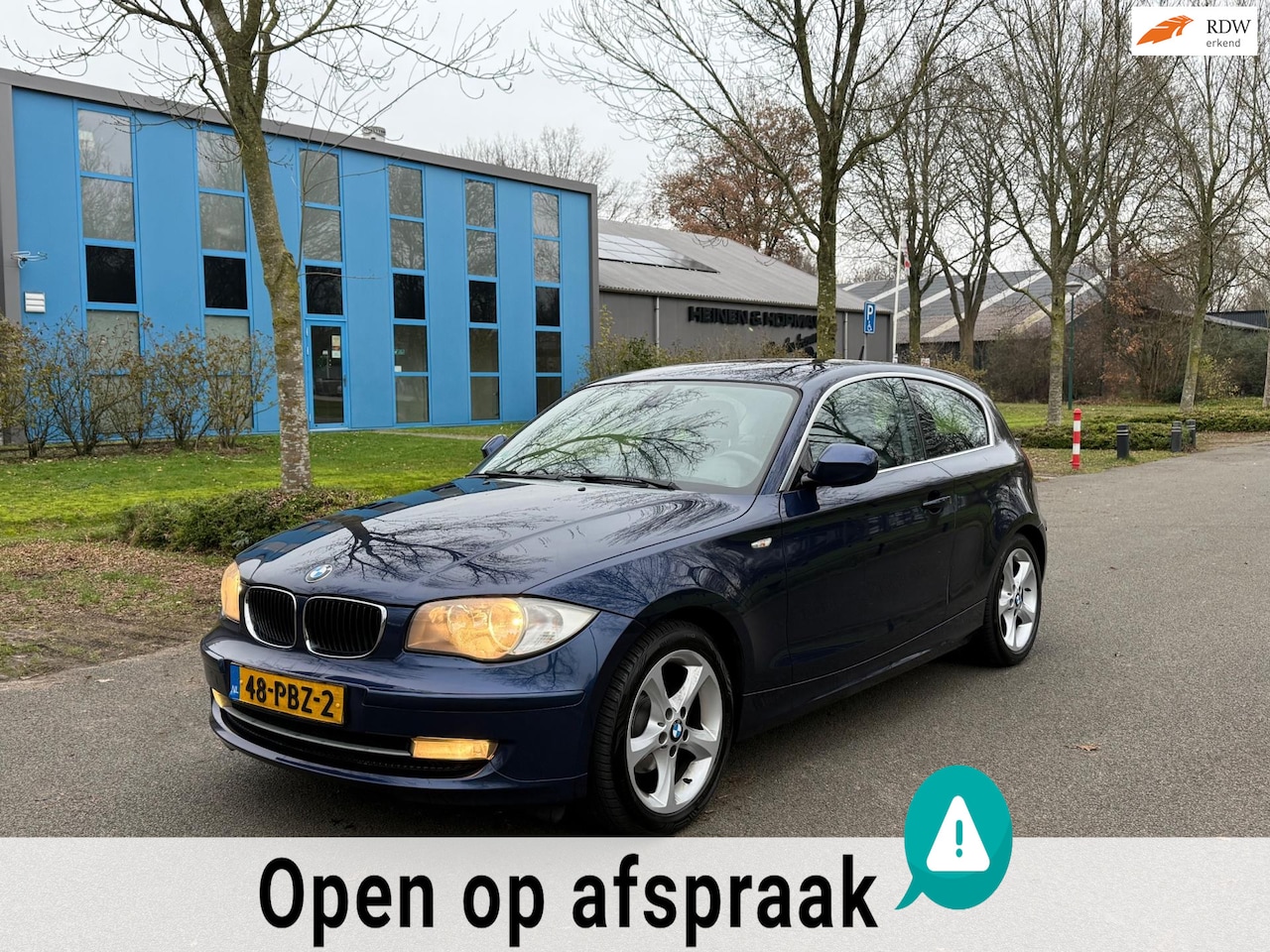 BMW 1-serie - 116i Business Line NAVI/M STUUR/CLIMATRONIC/NAP/ONDERHOUDSBOEKEJS! - AutoWereld.nl