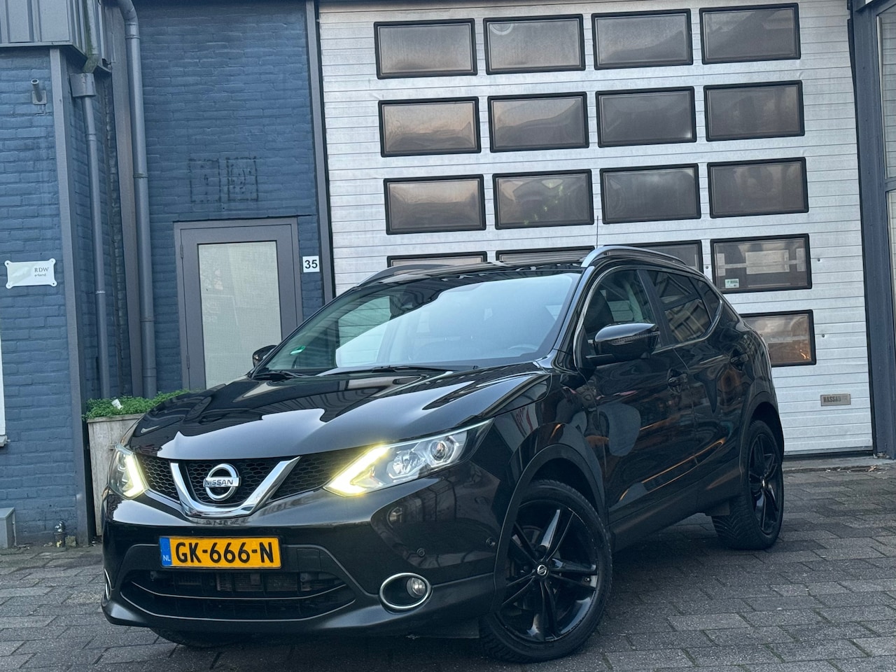 Nissan Qashqai - 1.2 Tekna | Clima | Leer | 360 Camera | N.A.P - AutoWereld.nl