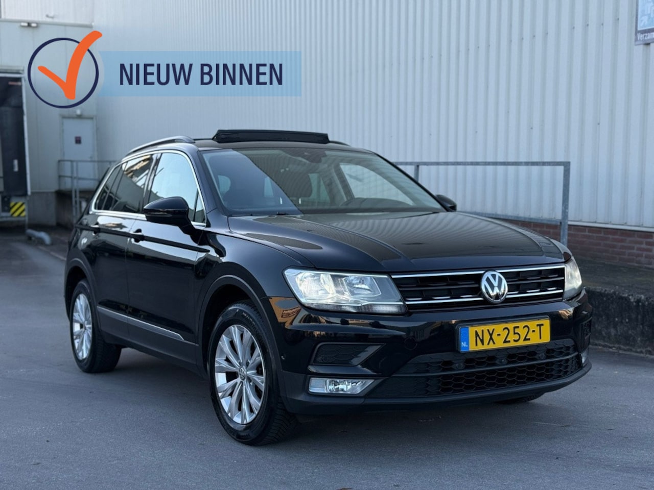 Volkswagen Tiguan - 1.4 TSI Comfortline | Navigatie | Panoramadak | Ergo-Active Stoe - AutoWereld.nl