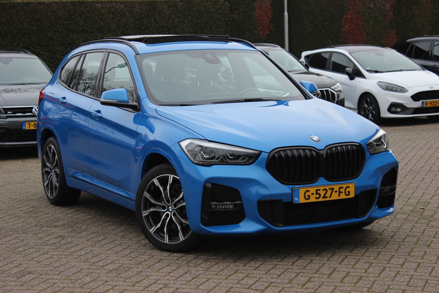 BMW X1 - sDrive20i High Executive Ed. / Trekhaak / Panoramadak / Camera / Head-up / 19'' / Memory s - AutoWereld.nl