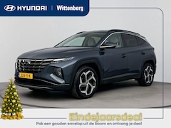 Hyundai Tucson - 1.6 T-GDI HEV Comfort | Ivoor leder | Trekhaak | Trekgewicht 1650kg | El. bed. stoelen | 1