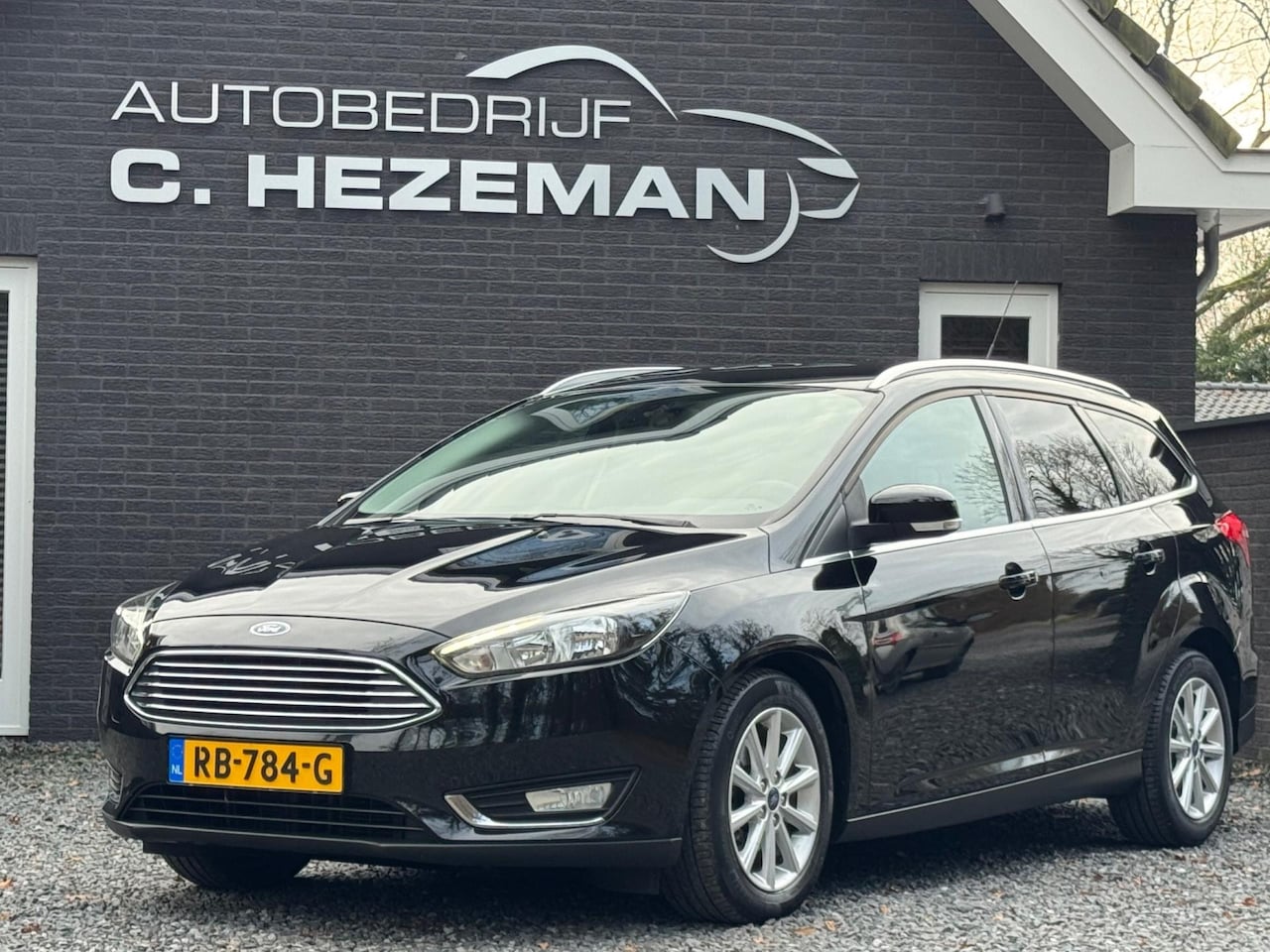 Ford Focus Wagon - 1.0 Titanium Navigatie Cruise Control Bluetooth Led Trekhaak Sportvelgen - AutoWereld.nl