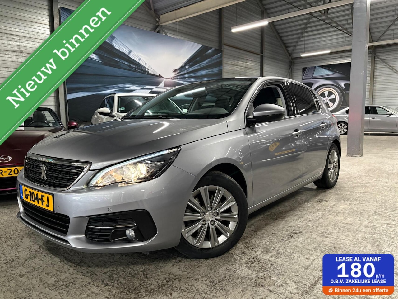 Peugeot 308 - 1.2 PT Blue Lease Premium 131pk | Pano | Trekhaak - AutoWereld.nl